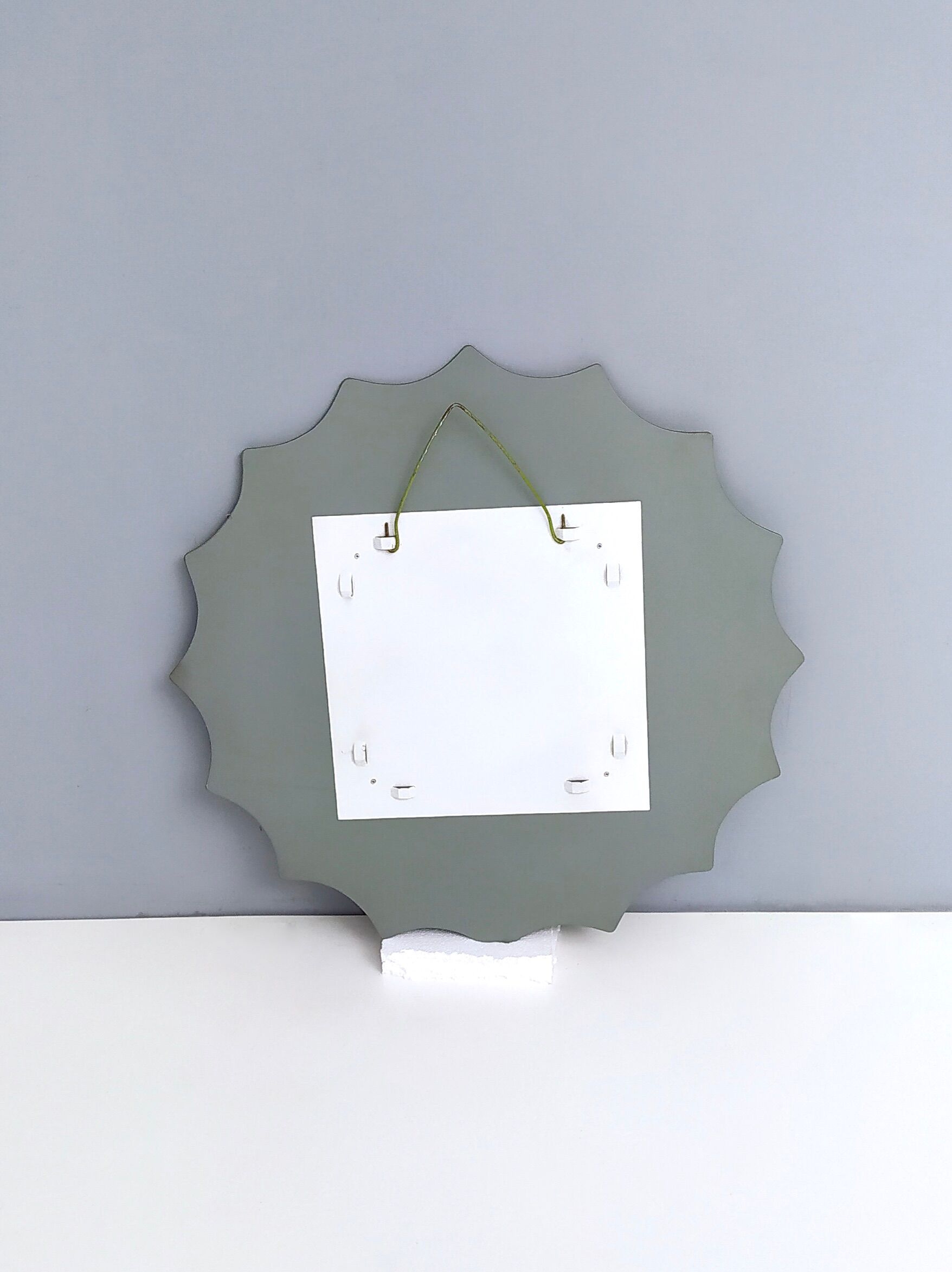Postmodern sun shaped bronze wall mirror, italy