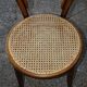 Two Turpe canned Bistro 1900 color rosewood chairs