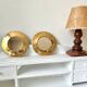 Round mirrors strapping in vintage gilded brass