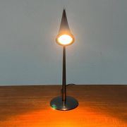 Postmodern table lamp model Ara by Philippe Starck for Flos, 1980s.
