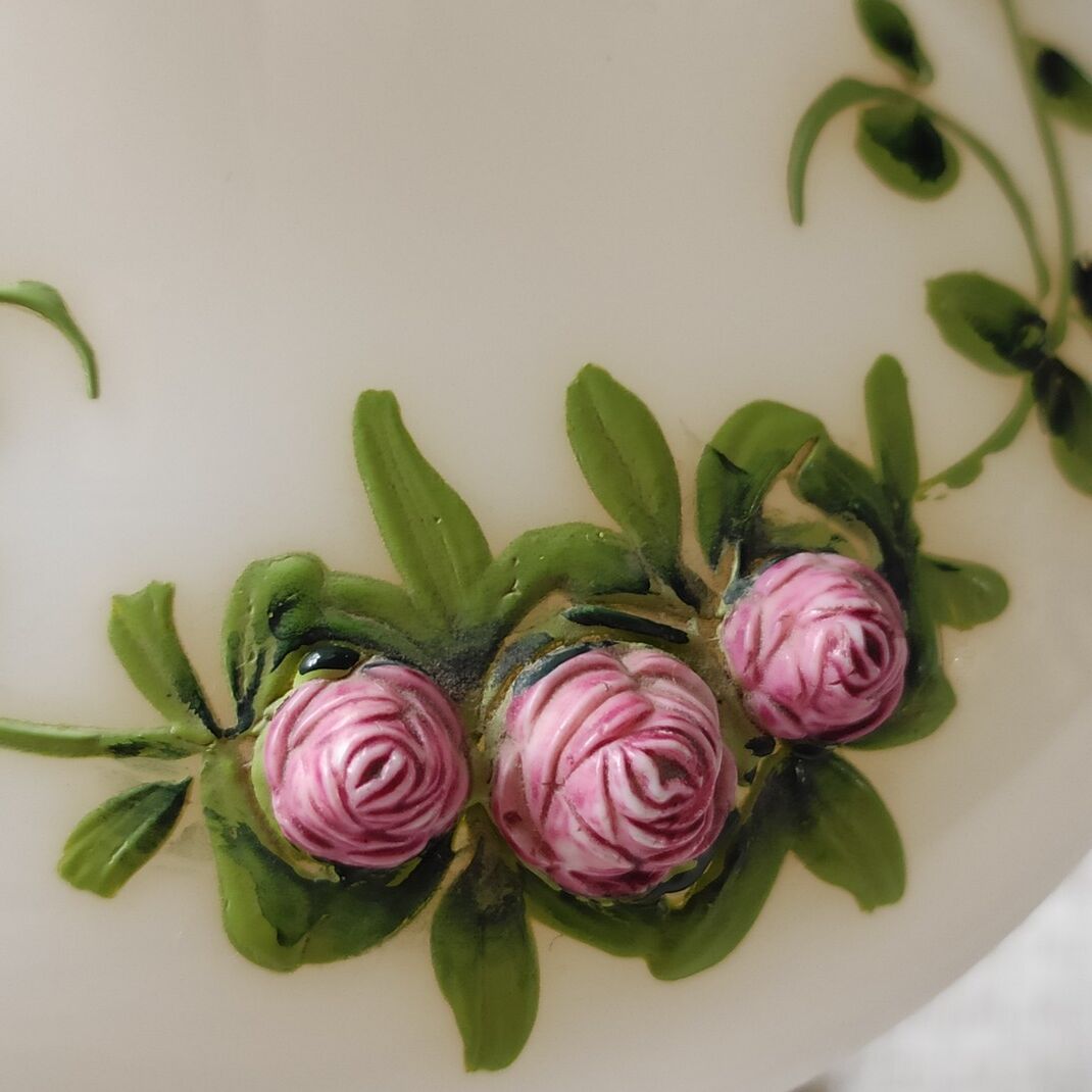White opaline vase decorated with roses