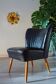 Fauteuil cocktail noir année 50