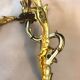 A pair of rococo gilded wall lights