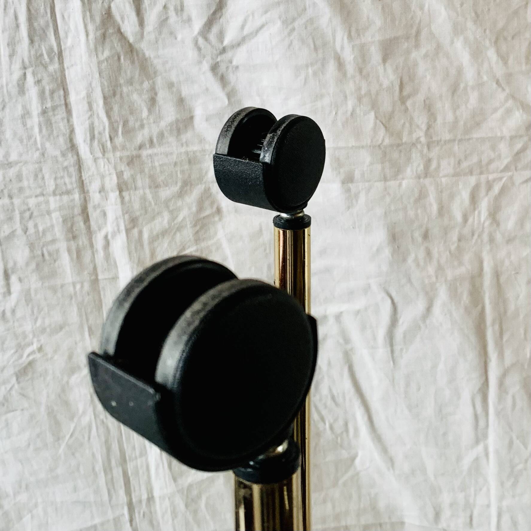 Magazine rack, saddle on vintage wheels