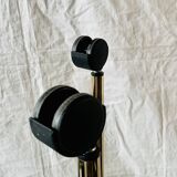 Magazine rack, saddle on vintage wheels