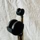 Magazine rack, saddle on vintage wheels
