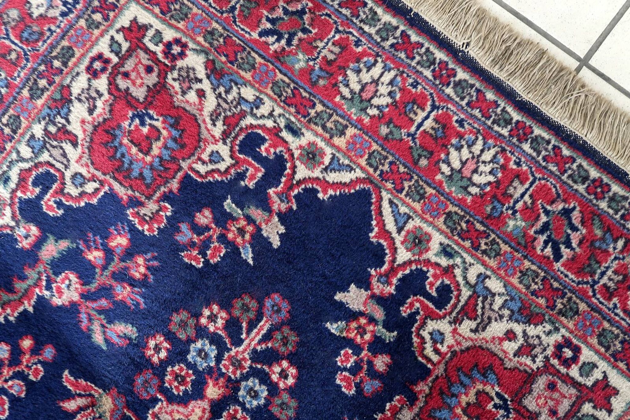 Tapis Kerman antique en laine bleue et rouge