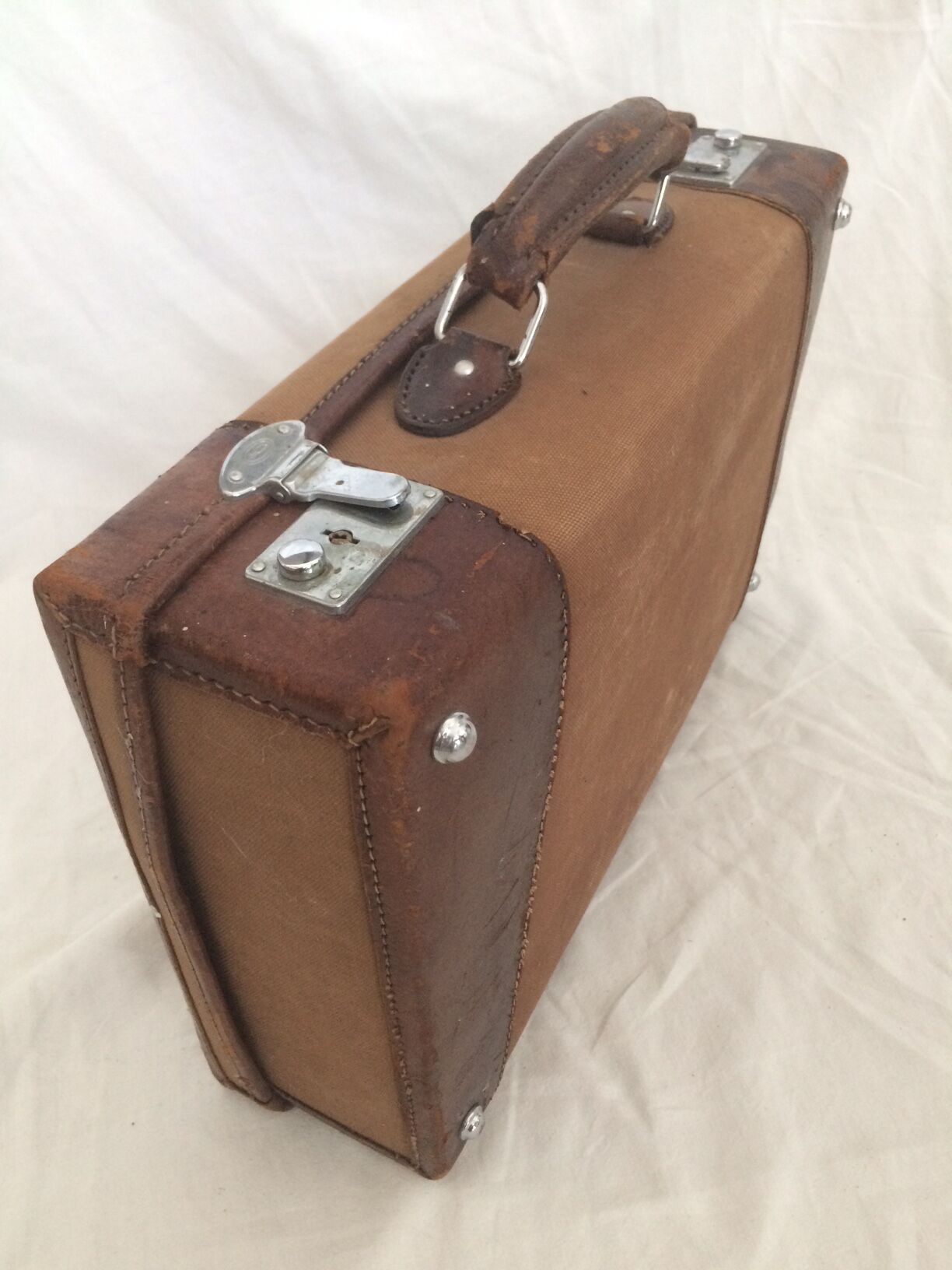 Cloth suitcase and leather vintage
