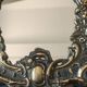 Antique dressing table mirror. Easel stand. In old gold bronze 22x17.