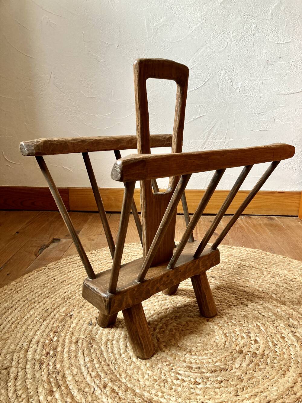 Brutalist magazine rack in the style of Jean Touret, 1950s.