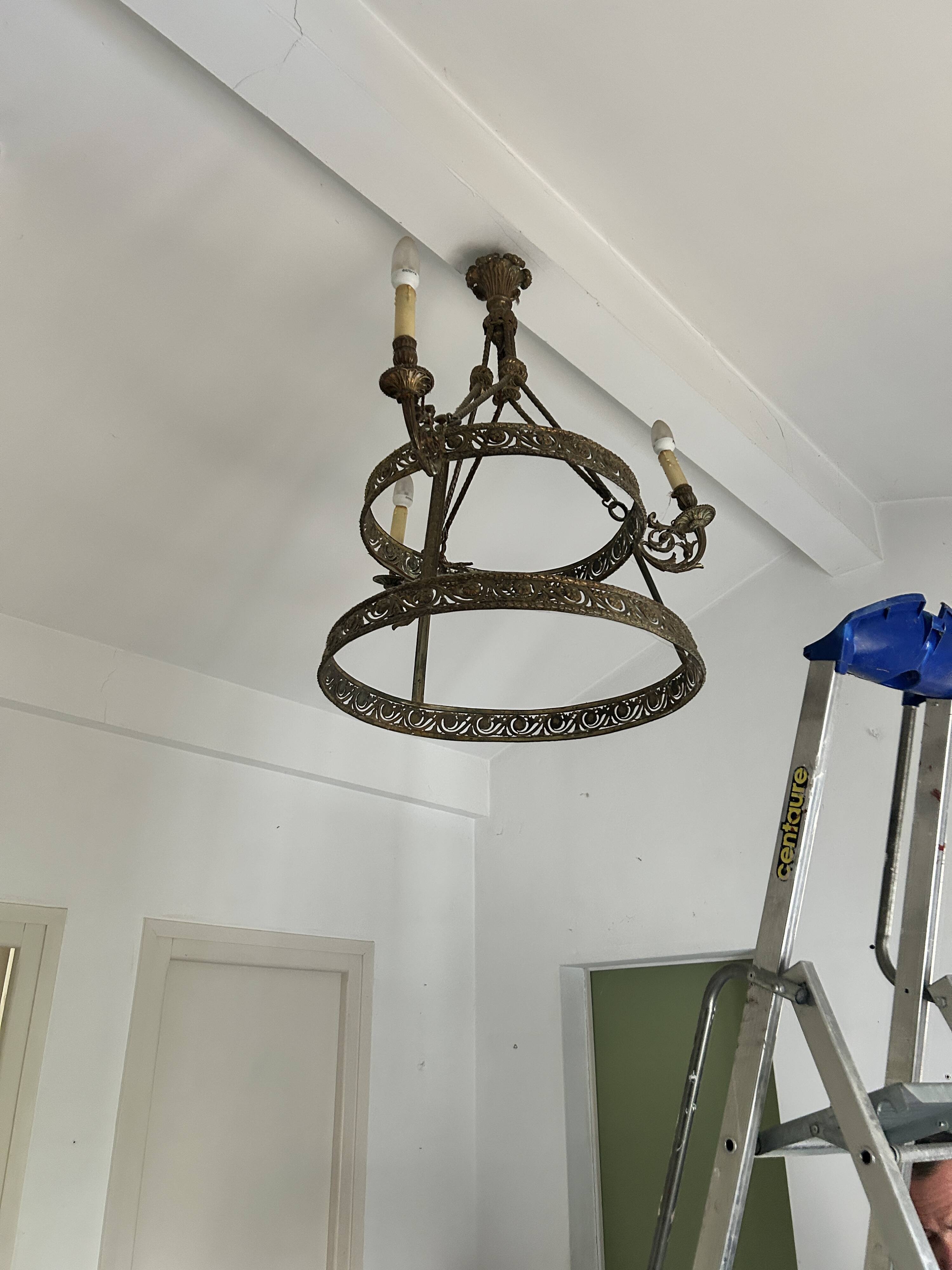 Brass chandelier from the early 20th century.