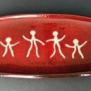 Large red ceramic dish
