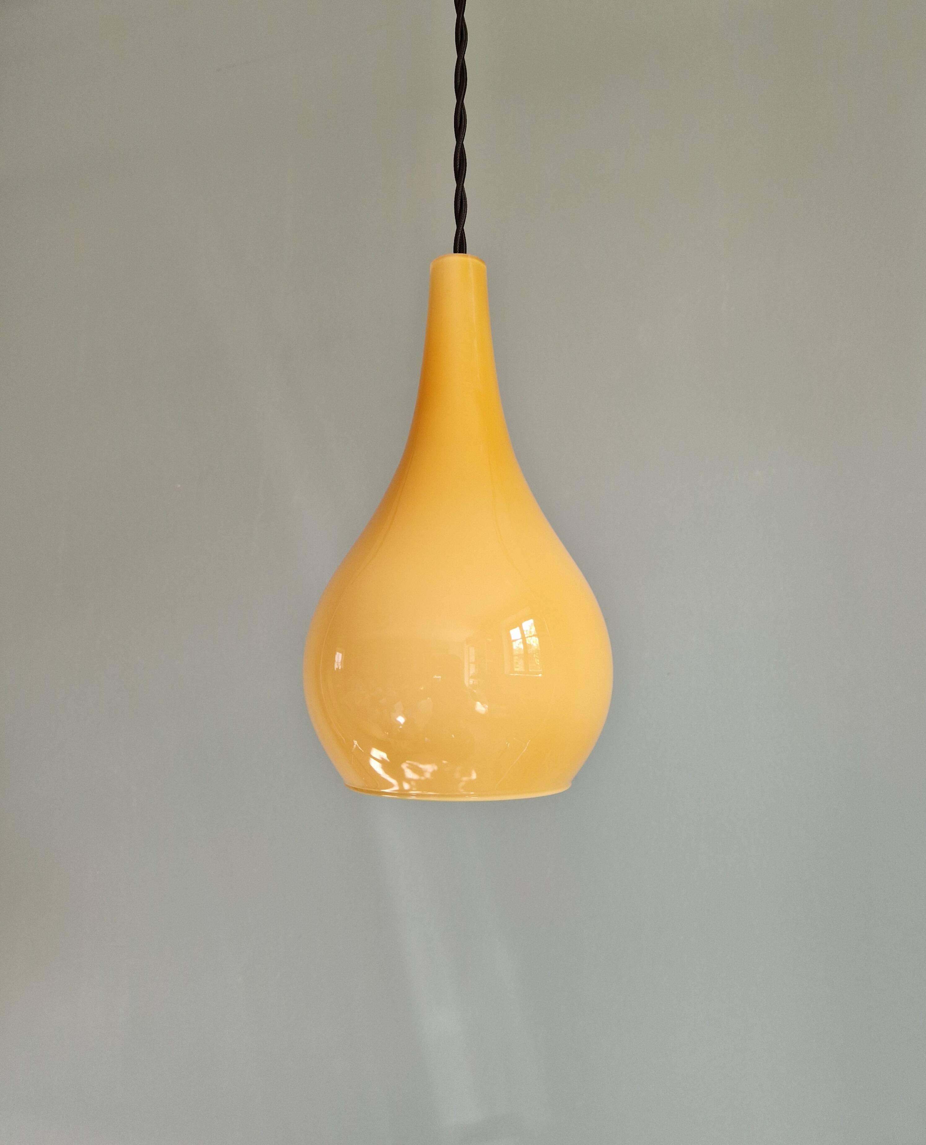 Scandinavian pendant light in honey-colored opaline glass, 1960s