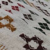 White carpet with multicolored Berber patterns handmade