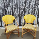 Two rattan bar armchairs