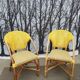 Deux fauteuils de bar en rotin