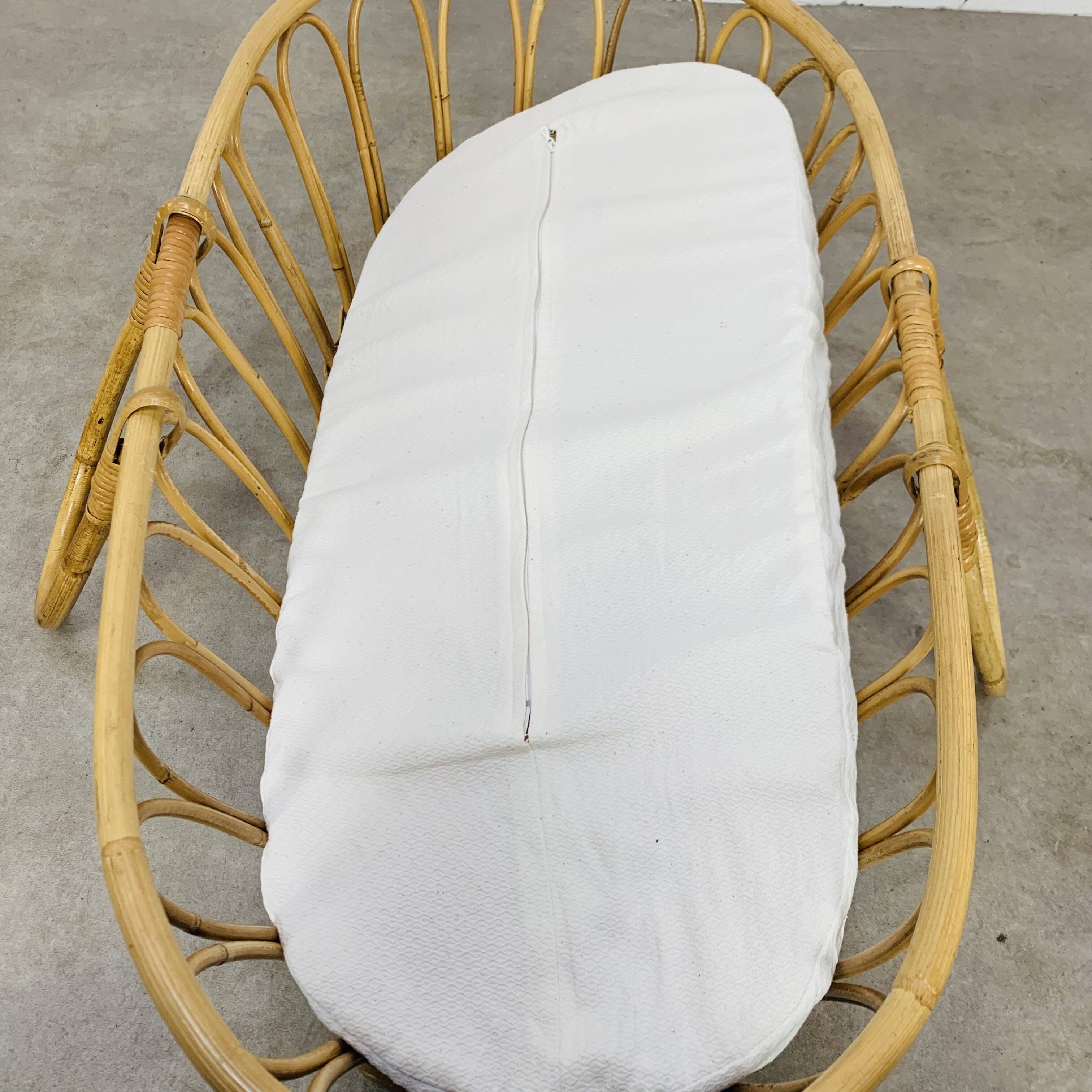 Vintage rattan baby bassinet