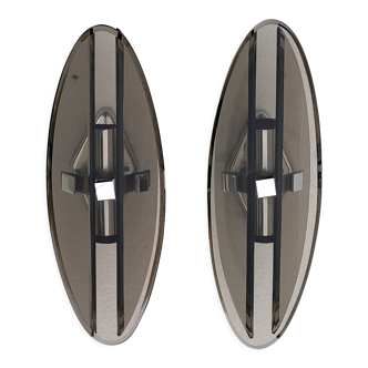 Pair of elliptical italian wall lamps in smoked glass and chrome veca