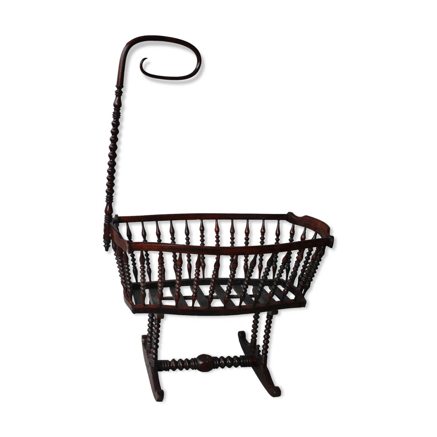 Old mahogany tinted exotic wooden cradle