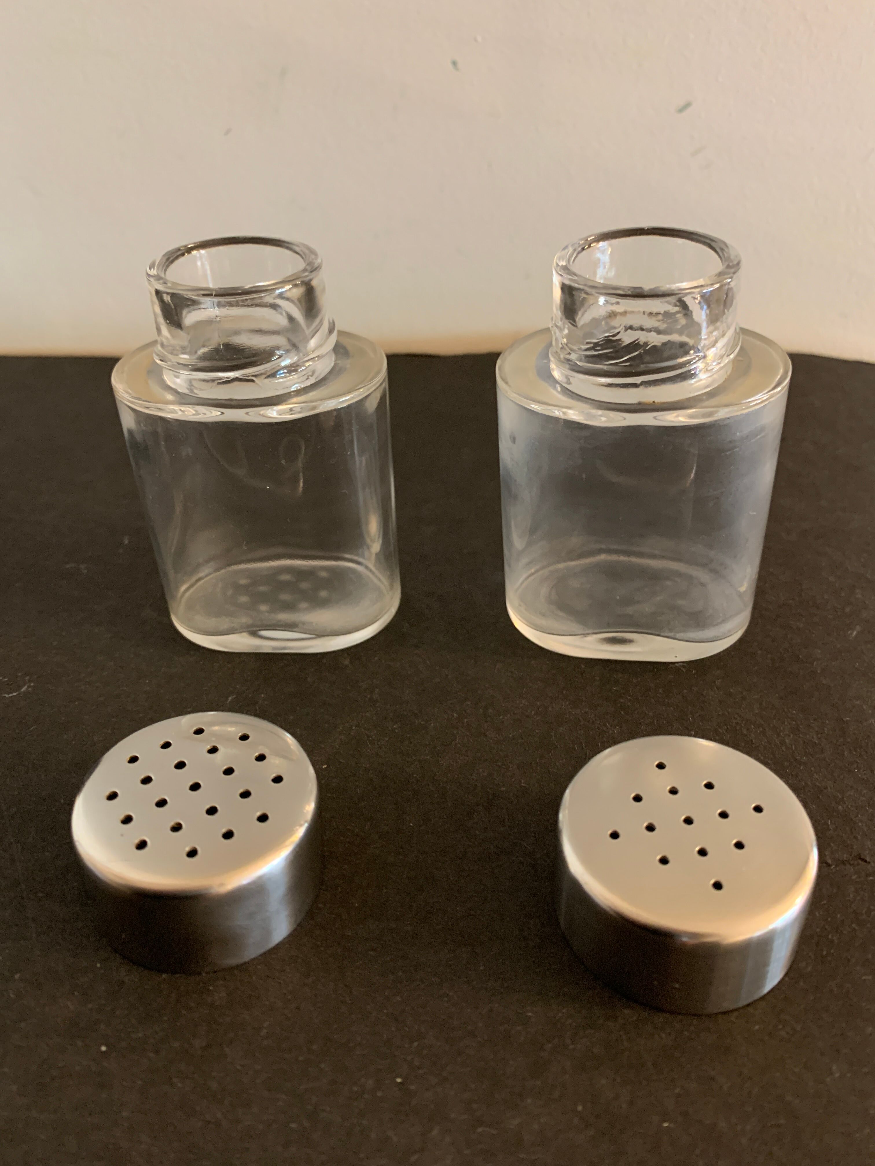 Italian salt and pepper shaker in stainless steel and Alessi glass, 1980