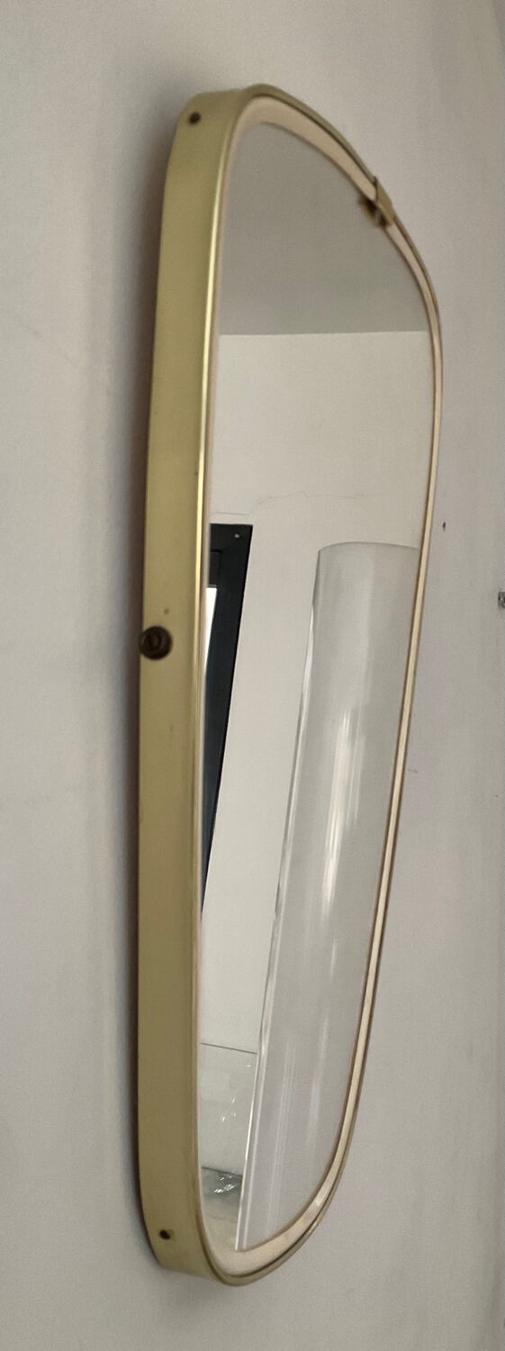 Asymmetrical mirror from the 60s freeform