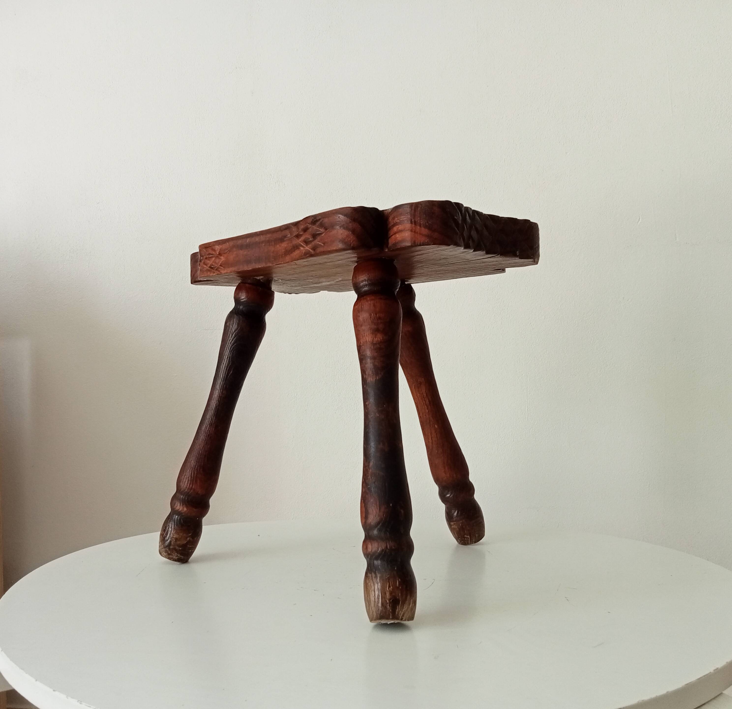 Brutalist Spanish tripod stool in solid carved wood.