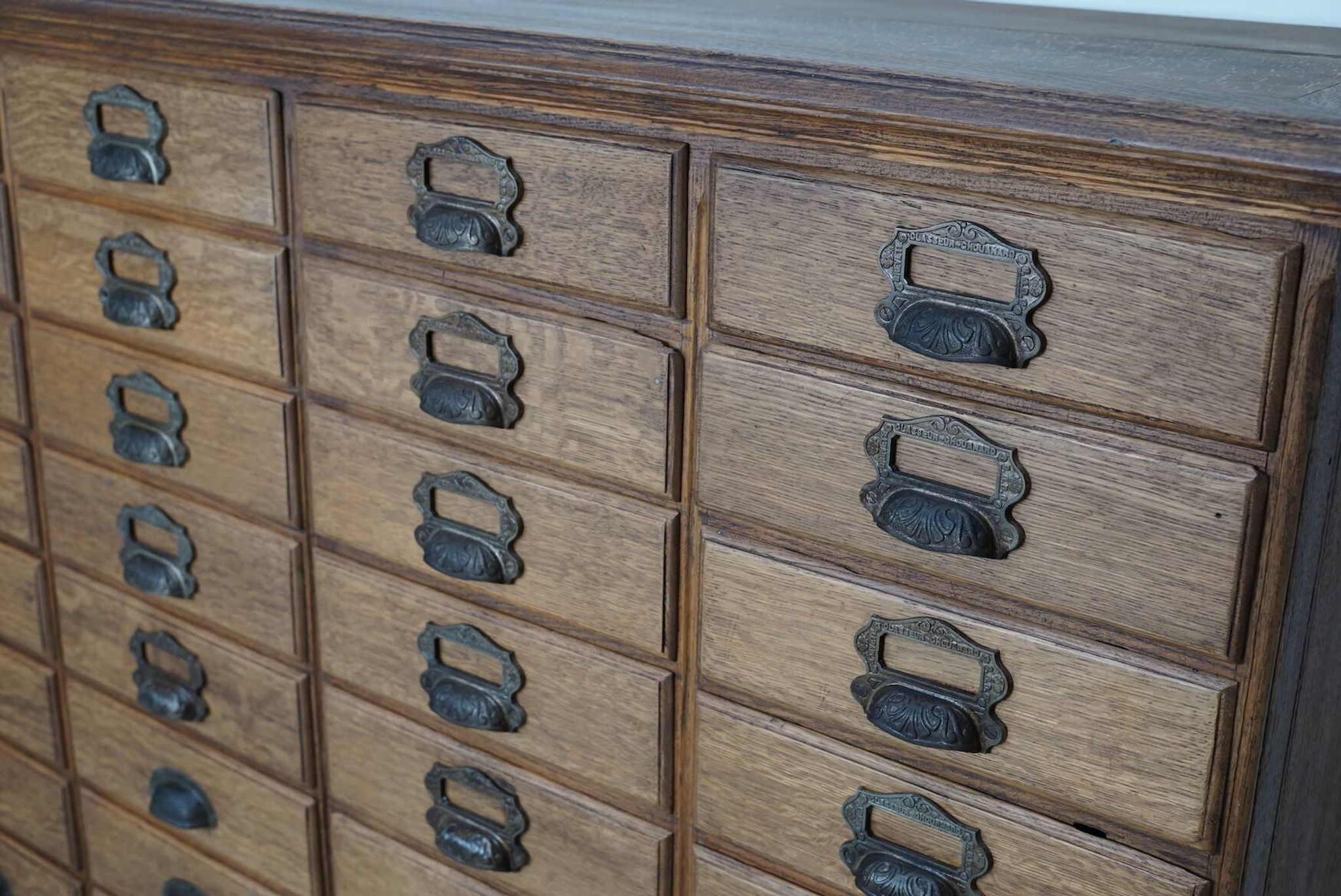 Antique French oak filing / apothecary cabinet by Chouanard, ca 1910