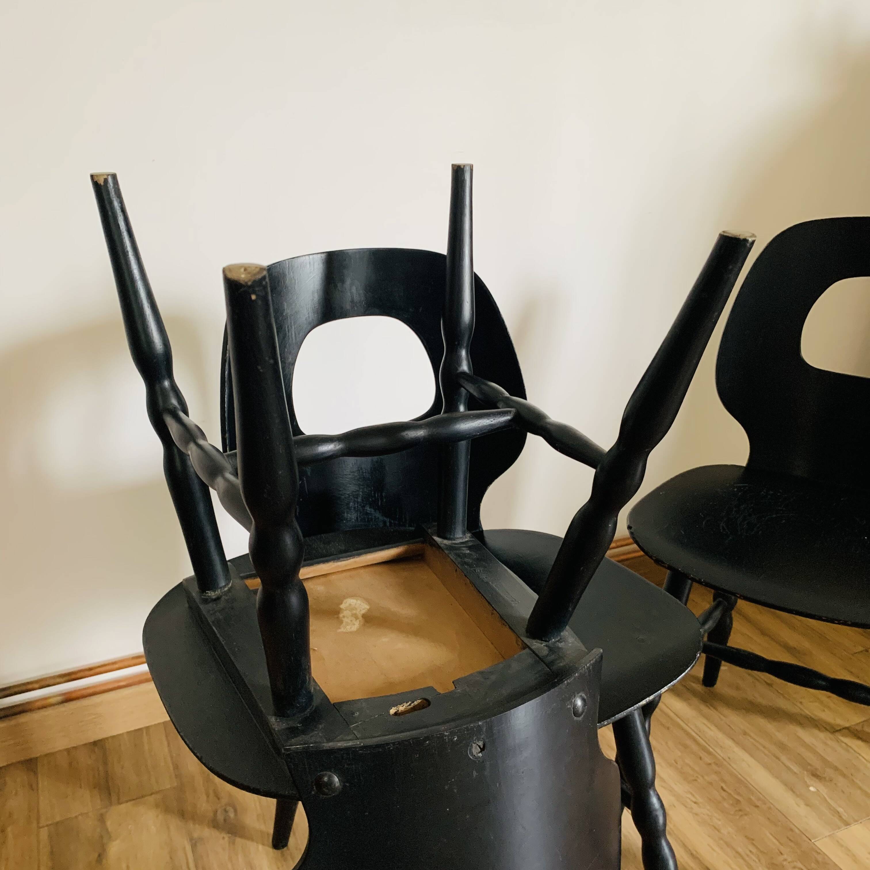 Set of 3 black Baumann eye model chairs
