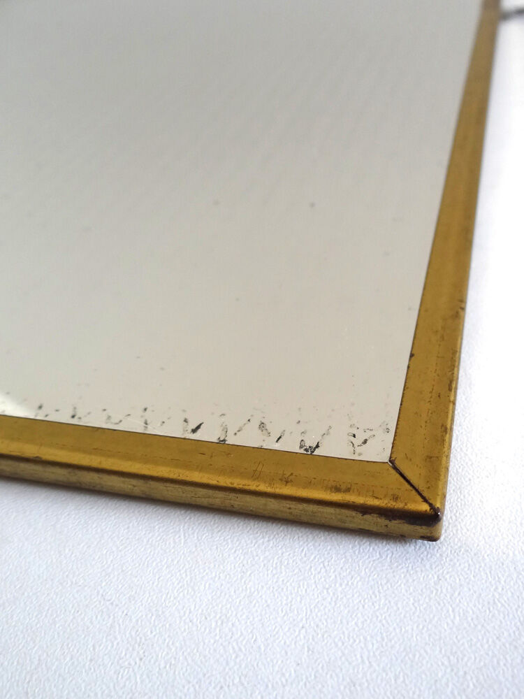 Miroir en métal doré 36 x 34 cm