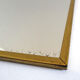 Miroir en métal doré 36 x 34 cm