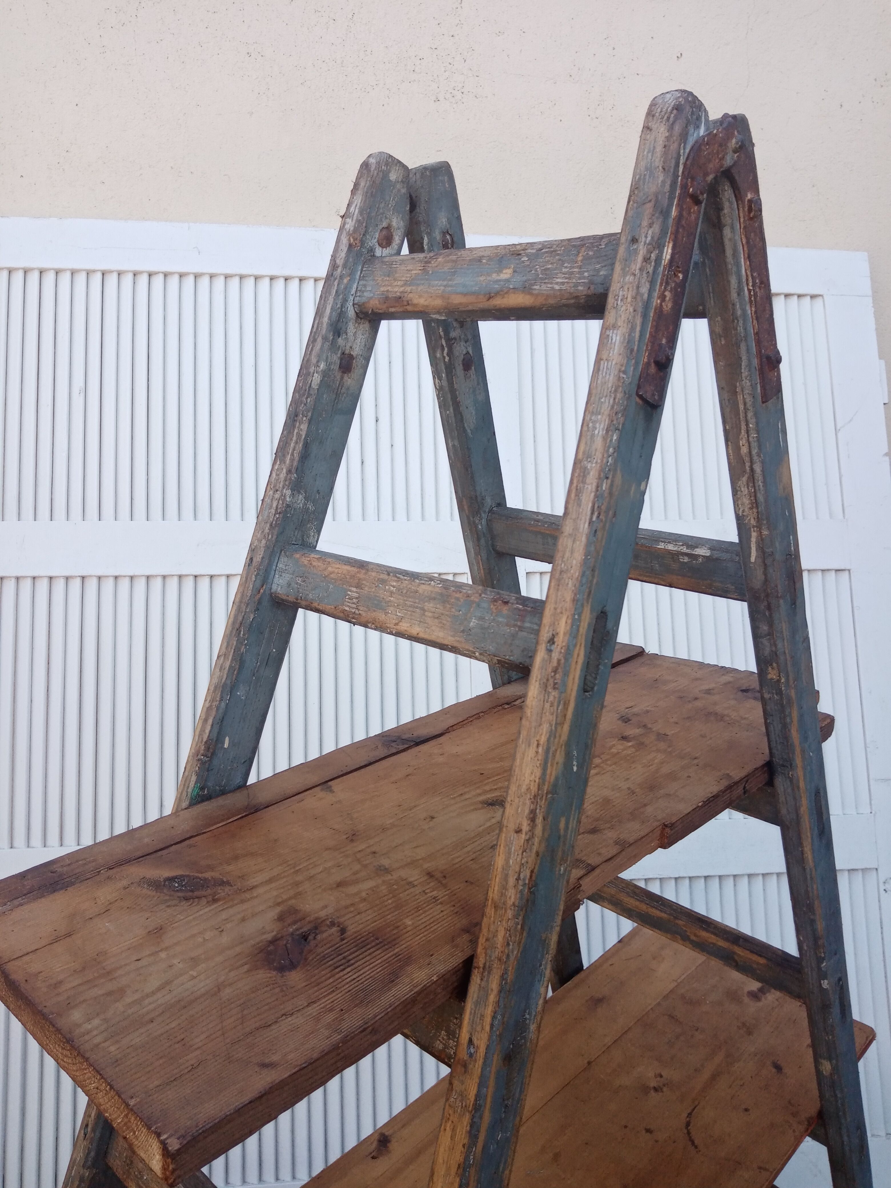 Old stepladder wooden shelf