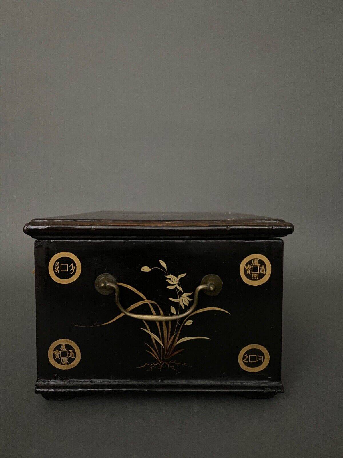 20th century Indian wooden box black lacquer decorated with animals with gold highlights