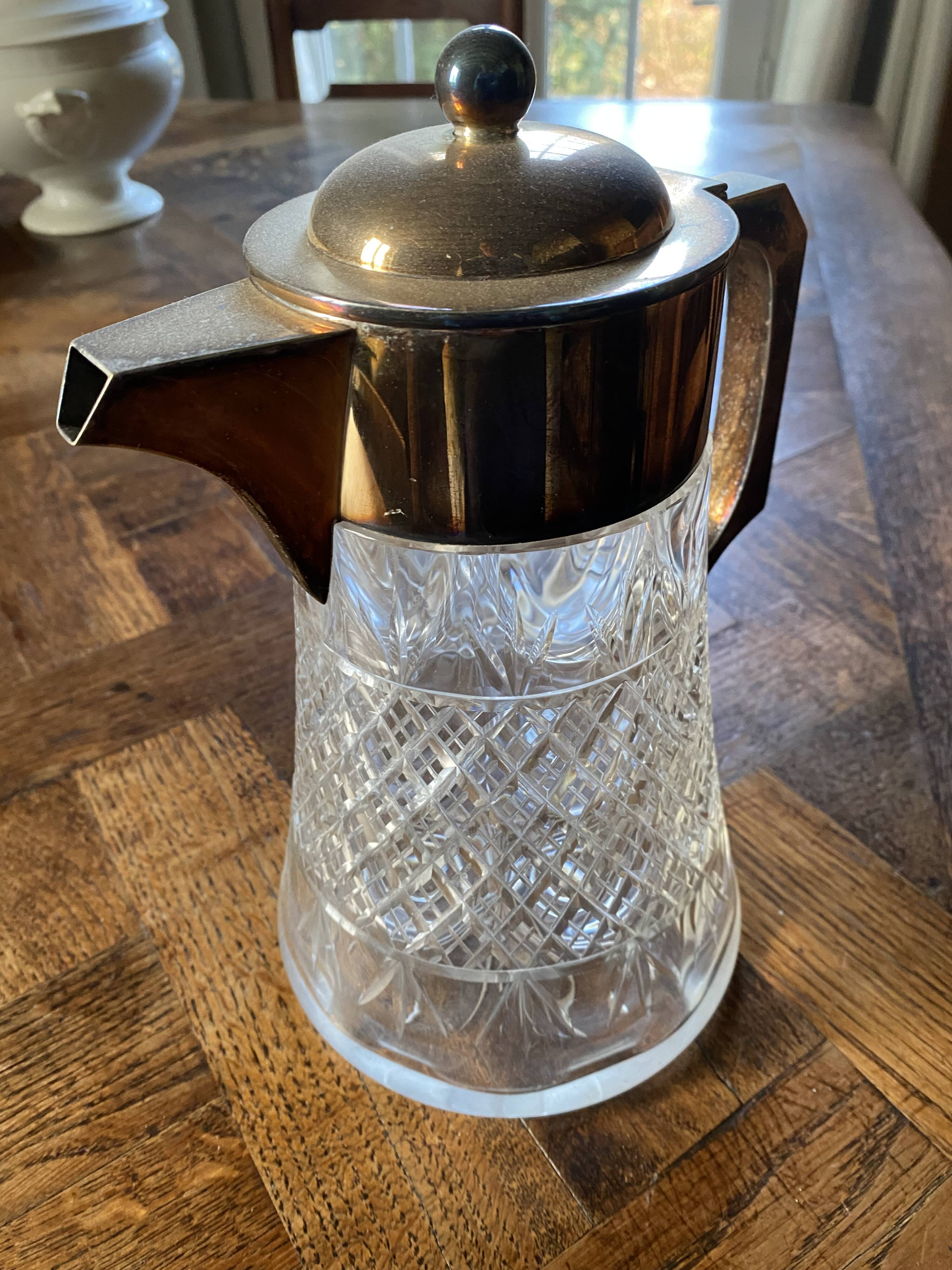 Glass and silver carafe