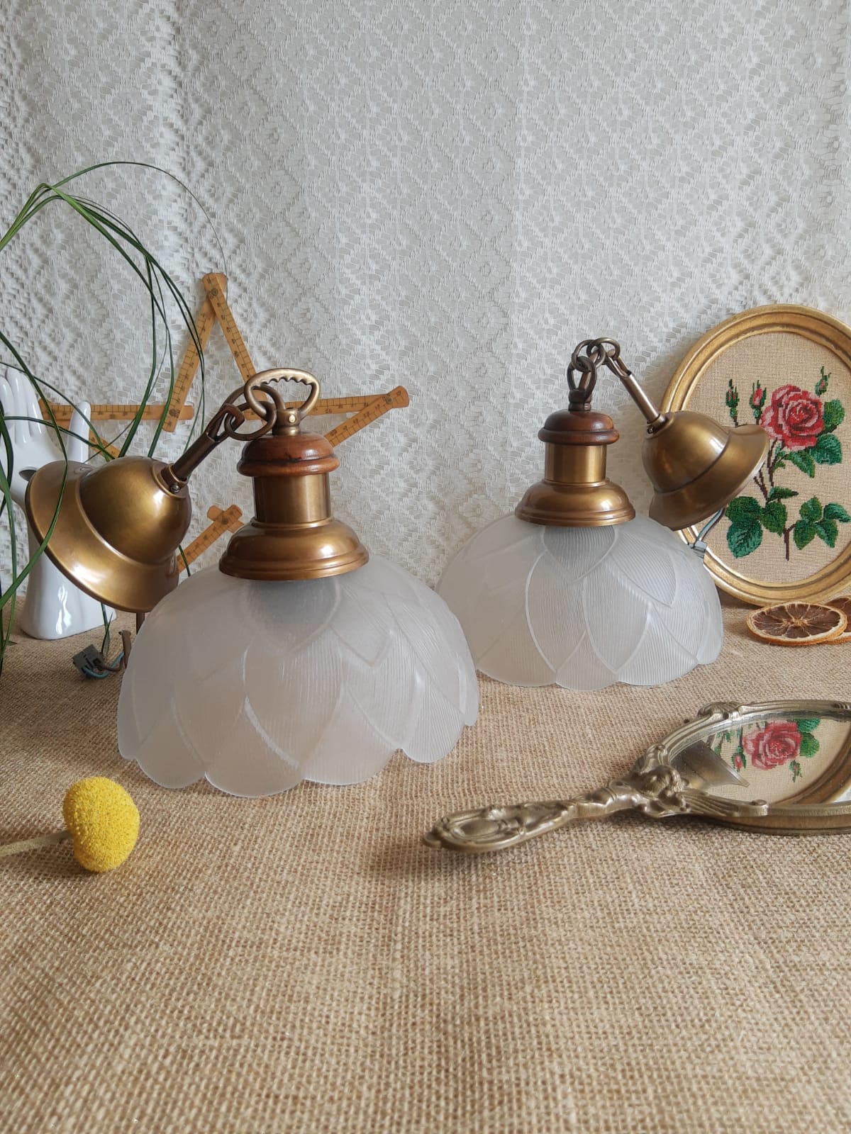 Pair of frosted glass flower pendant lights with vintage wood and brass