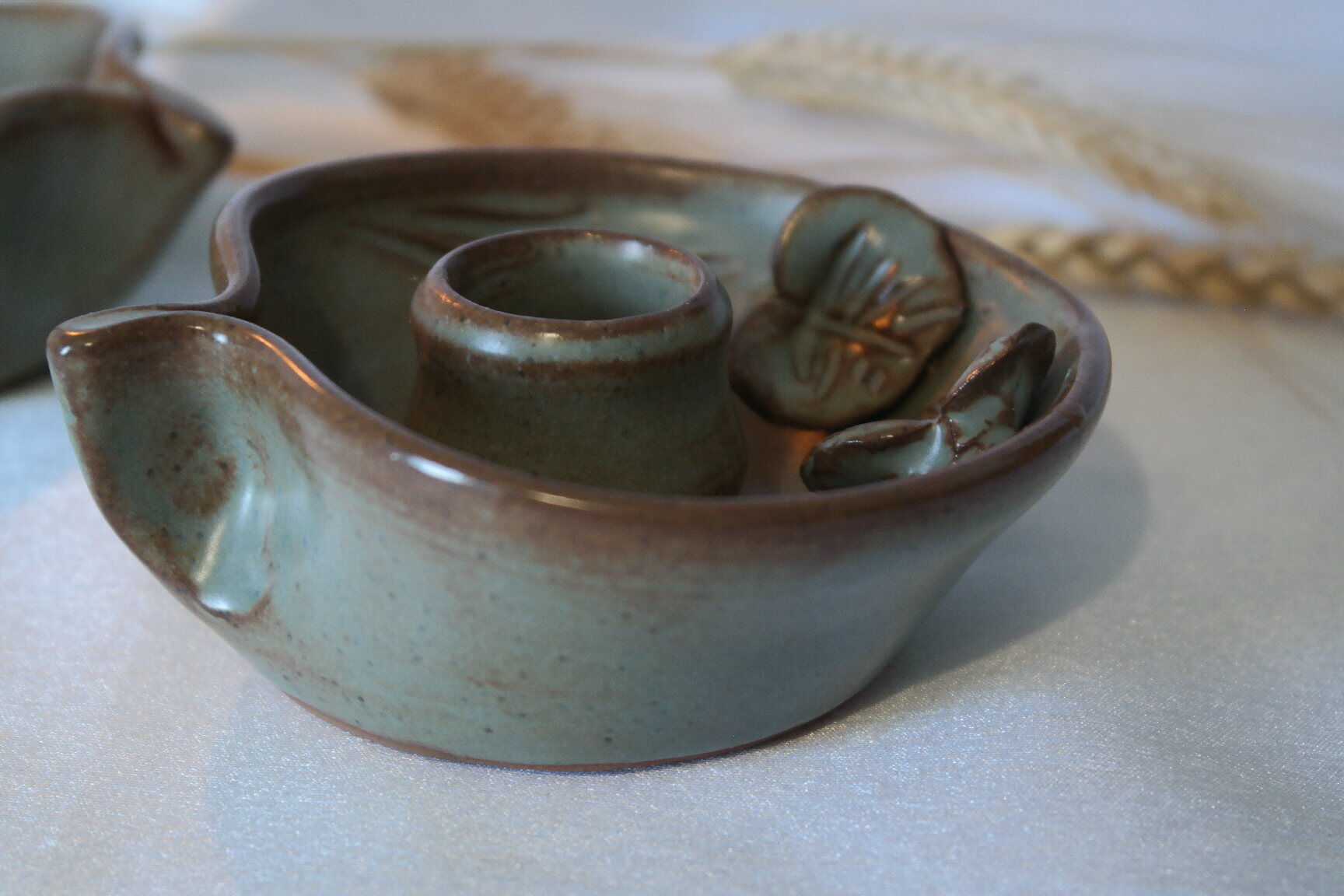 Pair of cellar rat candle holders in glazed sandstone