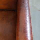 Vintage set of 4 sheepskin leather dining chairs on castors