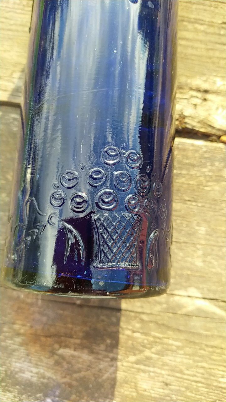 Vintage decorated glass bottle