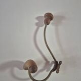 Vintage 1960s wall coat rack in wood and metal.