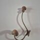 Vintage 1960s wall coat rack in wood and metal.
