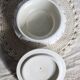 Vintage ivory earthenware candy box with blue polka dots