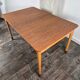 Rare teak and maple dining table with 2 extensions by Finn Juhl for Bovirke, Denmark, 1950.
