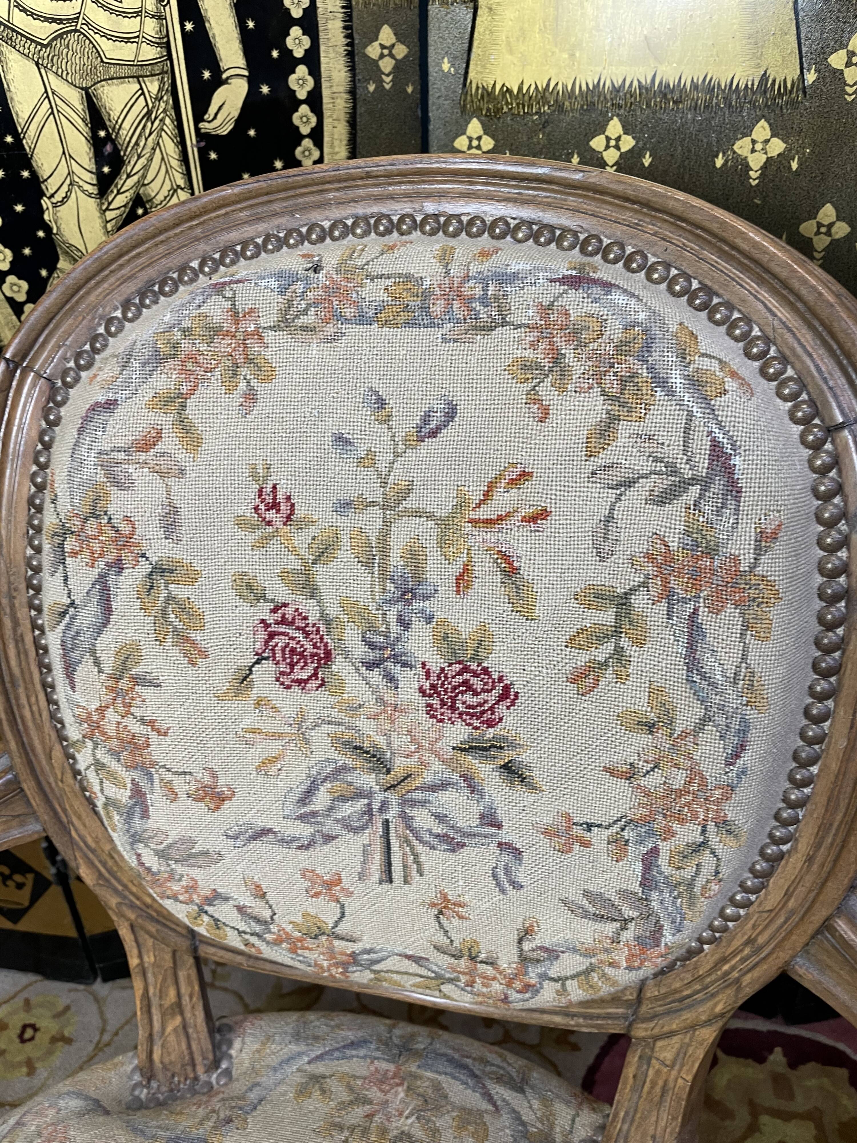 Pair of Louis XVI period medallion armchairs