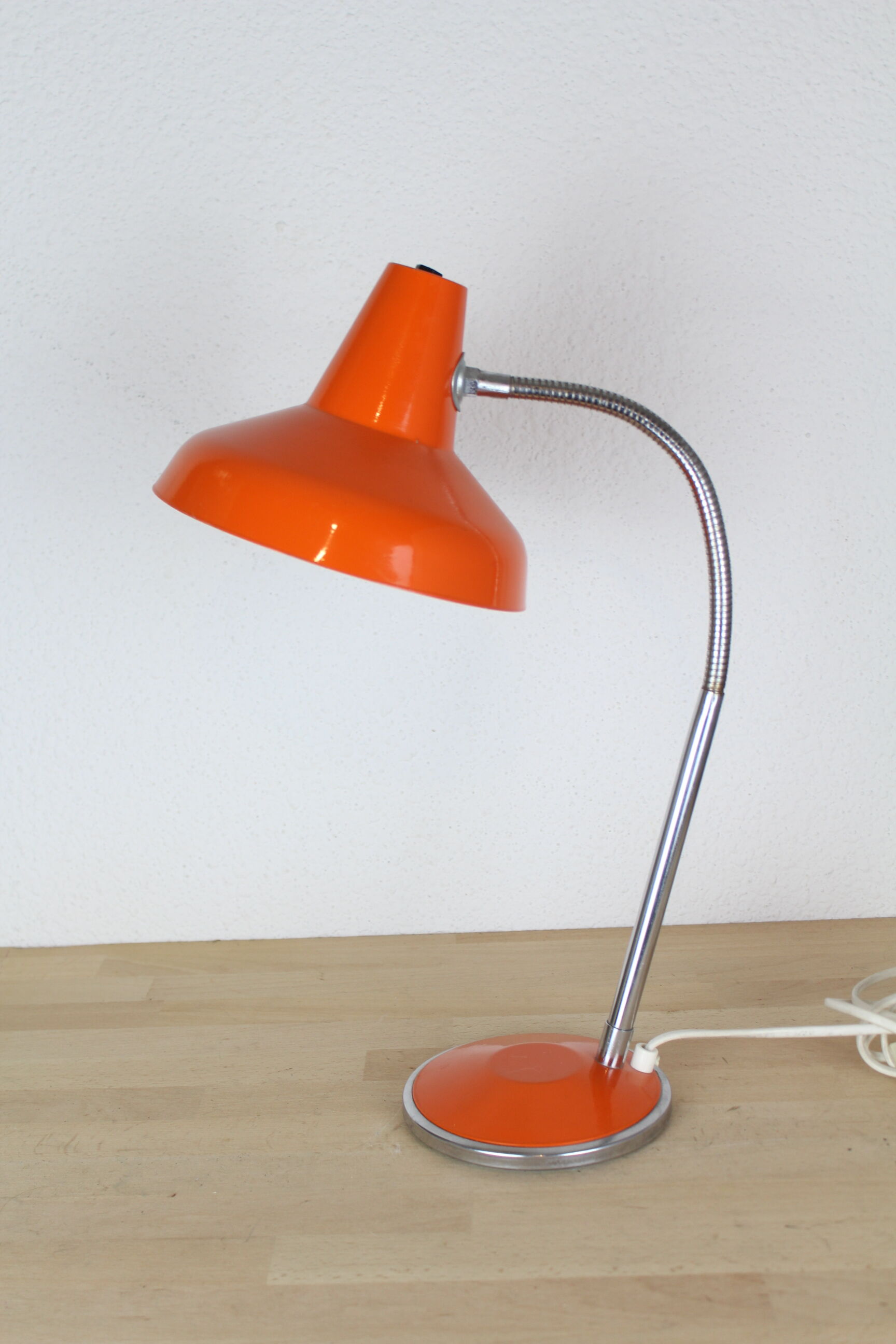 Orange and chrome metal desk lamp