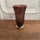Frosted Shneider vase with pink background enhanced with golden vine leaves