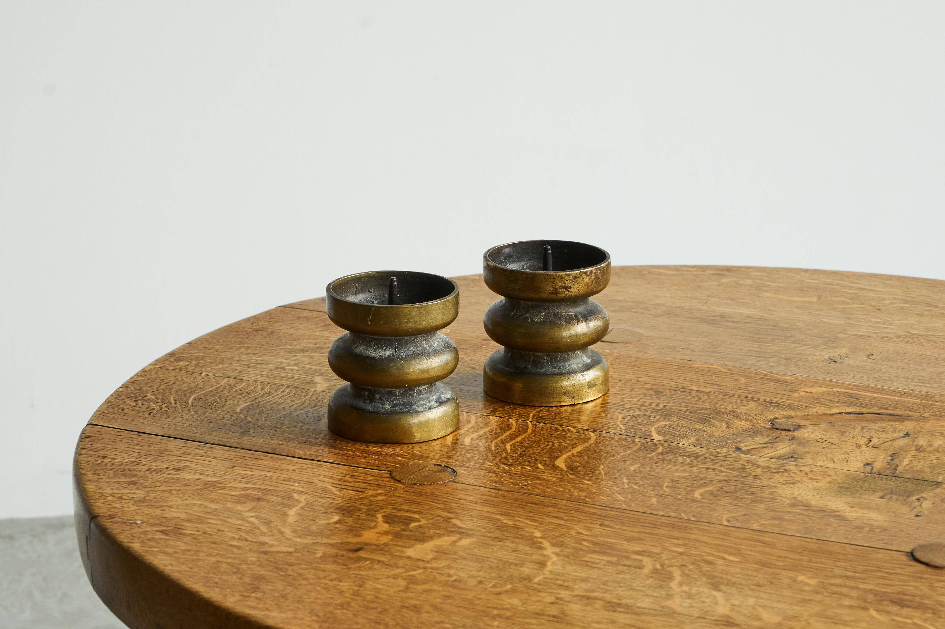 Brutalist pair of patinated bronze candle holders, 1960s