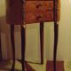 Louis XV style bedside table with varnished marquetry.