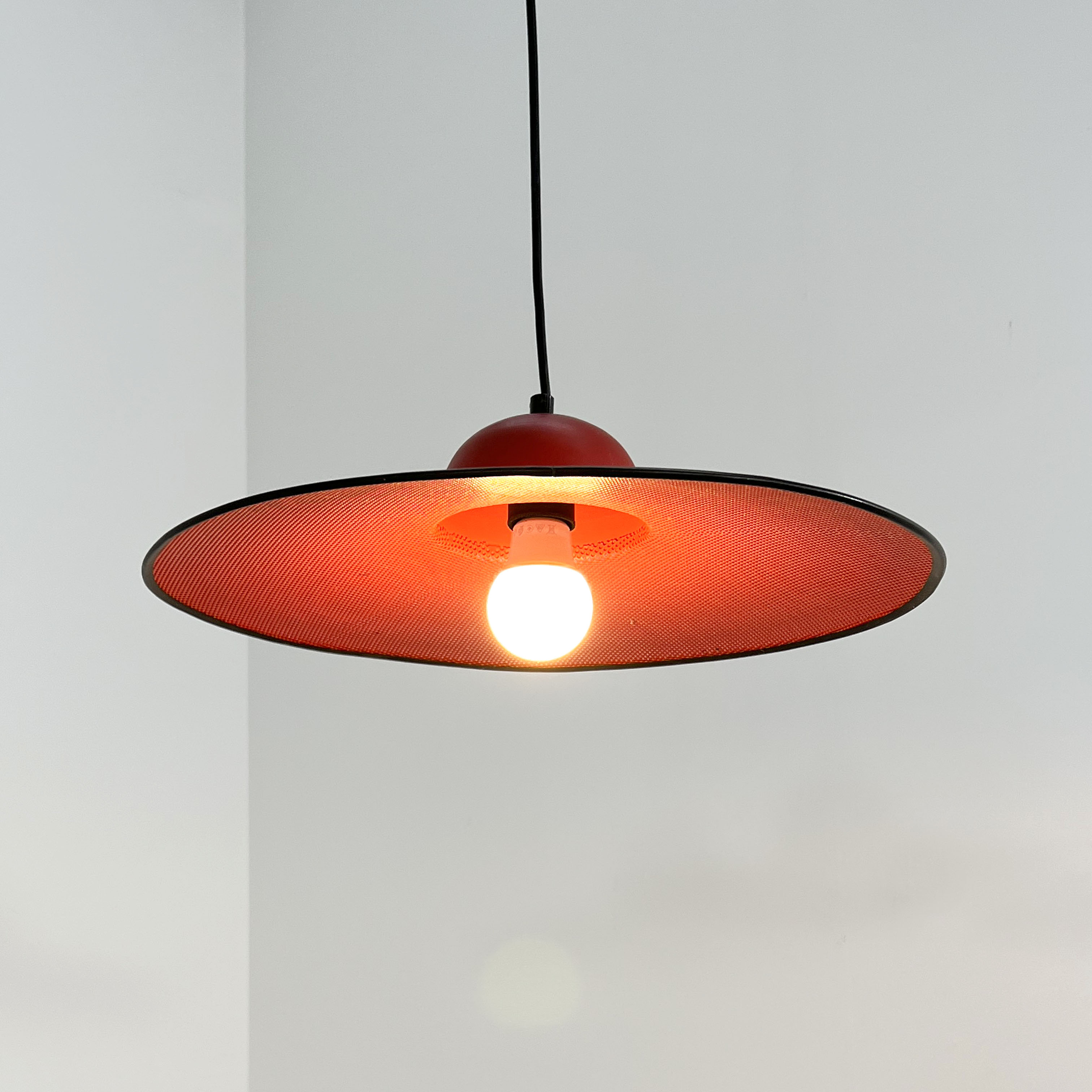 Red suspension lamp in perforated metal, 1970