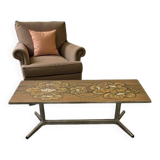 Vintage ceramic coffee table with a chrome frame.