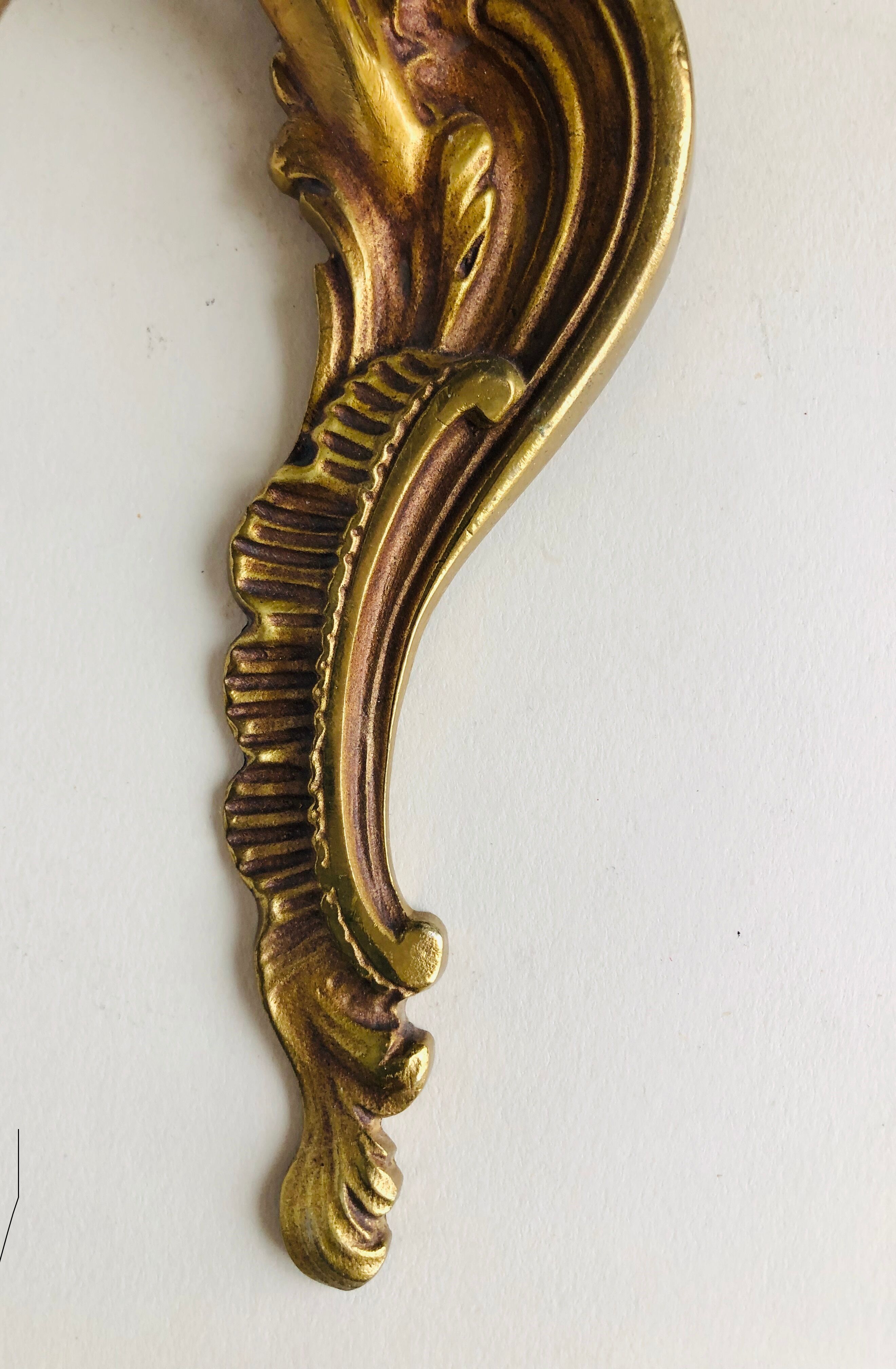 Wall light in gilded bronze