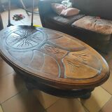 Ceramic and wood table in the shape of trees in the style of capron style